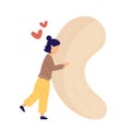 Girl hugging huge cashew with hearts above