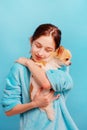 Teen girl and pet. The girl hugs her white Chihuahua dog Royalty Free Stock Photo