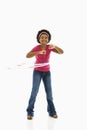 Girl with hula hoop. Royalty Free Stock Photo