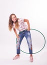 Girl with hula hoops on a white background Royalty Free Stock Photo