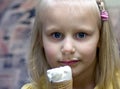 Girl and ice-cream cornet Royalty Free Stock Photo