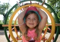 Girl inside climbing frame