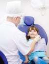 Girl during inspection of oral cavity