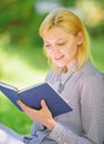 Girl interested sit park read book nature background. Reading inspiring books. Female literature. Relax leisure an hobby