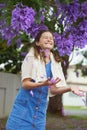 Girl and Jacaranda Tree Royalty Free Stock Photo