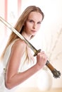 Girl with japanese sword Royalty Free Stock Photo