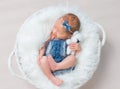 Girl in jeans costume napping, topview Royalty Free Stock Photo