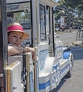 Girl in joyride train Royalty Free Stock Photo