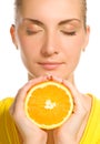 Girl with juicy orange Royalty Free Stock Photo