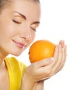 Girl with juicy orange Royalty Free Stock Photo