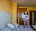 Girl jumping on the bed