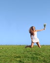 Girl jumping on field