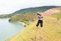 Girl jumping high above bay Royalty Free Stock Photo