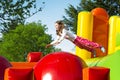 Girl Jumping on an Inflate Castle Royalty Free Stock Photo