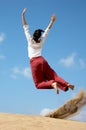 Girl jumping for joy Royalty Free Stock Photo