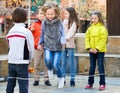 Girl jumping while jump rope game with friends Royalty Free Stock Photo