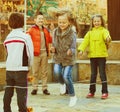 Girl jumping while jump rope game with friends Royalty Free Stock Photo