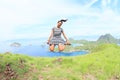 Girl jumping on Padar Island Royalty Free Stock Photo