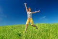 Girl jumping and stratching hands