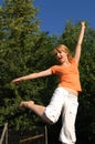 Girl Jumping on Trampoline Royalty Free Stock Photo