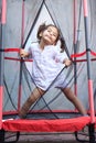 Girl jumping in the trampoline