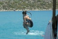 Girl jumping into the water Royalty Free Stock Photo