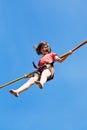 Girl jumps on bungee cord