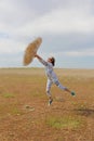 The girl jumps and depicts weightlessness and the absence of gravity