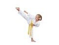 Girl in karategi beats kick Yoko geri Royalty Free Stock Photo