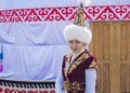 The girl in the Kazakh national dress.