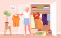 Girl keeping order in closet, woman holding hanger with dress and shirt to sort clothes