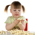 Girl keeps in hand popcorn