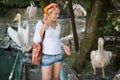 Girl in a kerchief at the zoo looking