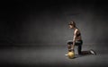 Girl with kettlebell on hand