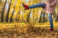 Girl kicked dry leaves