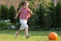 Girl kicking ball