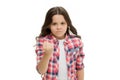 Girl kid threatening with fist isolated on white. Strong personality temper. Threaten with physical attack. Kids