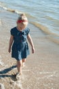 Girl kid walk water sea Royalty Free Stock Photo