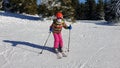 Girl kids skiing on montain snow