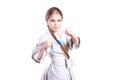 Girl in a kimono judo. In a fighting stance. Isolated on white background. Royalty Free Stock Photo