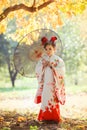 Girl in kimono walking in the city Park Royalty Free Stock Photo