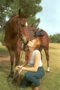 Girl kisses horse