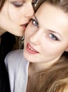 Girl kisses other girl Royalty Free Stock Photo