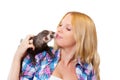 Girl kissing a ferret