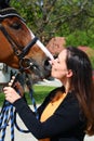 Girl kissing horse Royalty Free Stock Photo