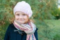 A girl in a knitted beret