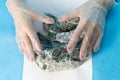 Female hands hold the dangerous mineral asbestos Royalty Free Stock Photo