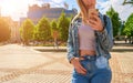 Girl lake summer. Happy young girl with phone smile, typing texting and taking selfie in summer sunshine urban city Royalty Free Stock Photo