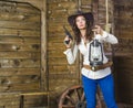 Girl with lamp cowboy Royalty Free Stock Photo