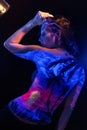 Girl with landscape bodyart in blacklight Royalty Free Stock Photo